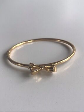 Kate Spade bow gold bracelet bangle